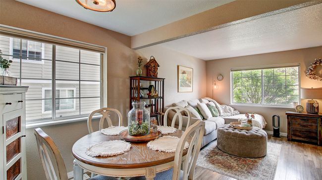 Dining space featuring wood finished floors | Image 8