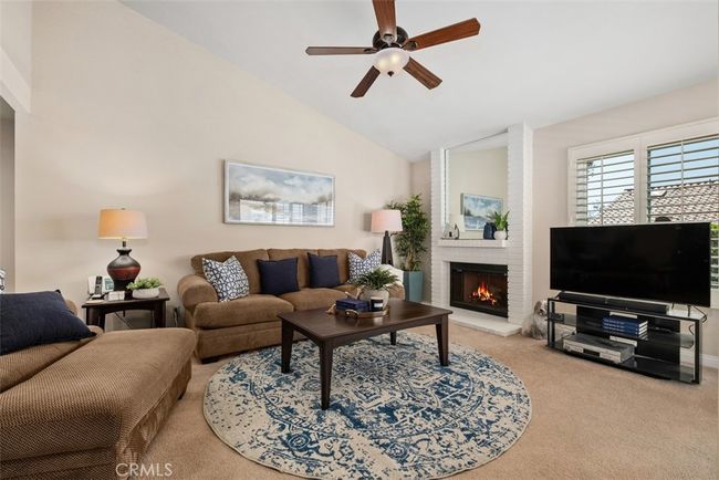 The living room also has a gas fireplace, perfect for those cool summer nights | Image 13