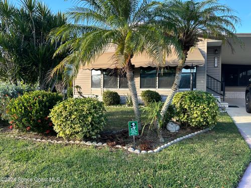 602 Dolphin Circle, Barefoot Bay, FL, 32976 | Card Image