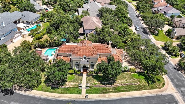 Aerial perspective of suburban area featuring a pool | Image 5