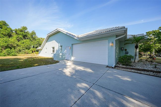 1065 Harbour Glen Pl, House other with 3 bedrooms, 2 bathrooms and null parking in PUNTA GORDA FL | Image 43
