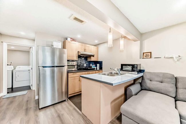 66 Evansbrooke Terr Nw, House other with 5 bedrooms, 4 bathrooms and 4 parking in Calgary AB | Image 37