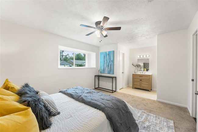 Large master suite with ample closet space. | Image 15