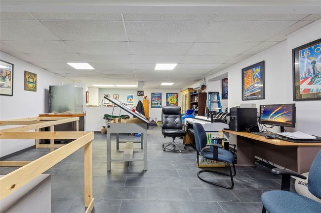 Office area with a paneled ceiling | Image 39