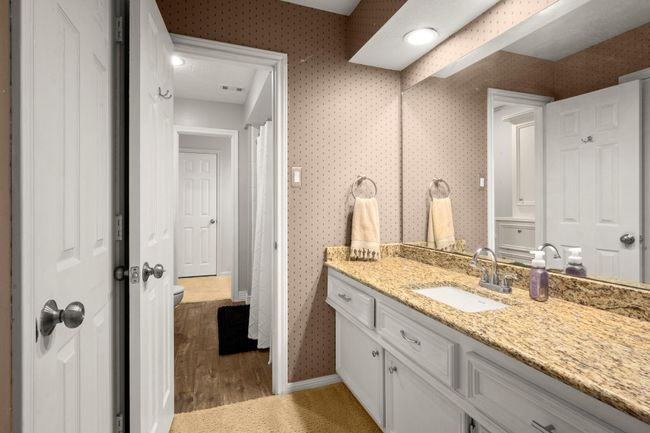 Bath 3 Jack-n-Jill - Accessed from Bedroom 3 has it's own vanity and sink. Tub/toilet room can be closed for privacy. The walk-in closet for bedroom 3 to the right. | Image 31