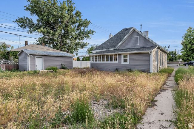 View of home's exterior with an outbuilding | Image 17
