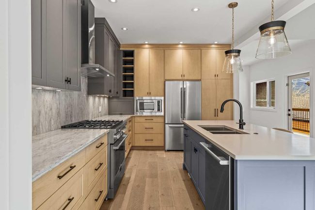 249A Three Sisters Drive, Home with 4 bedrooms, 4 bathrooms and 4 parking in Canmore AB | Image 9