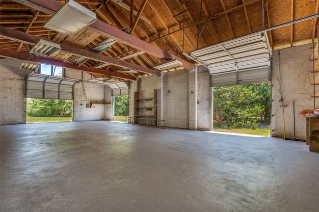 Garage with concrete block wall | Image 18