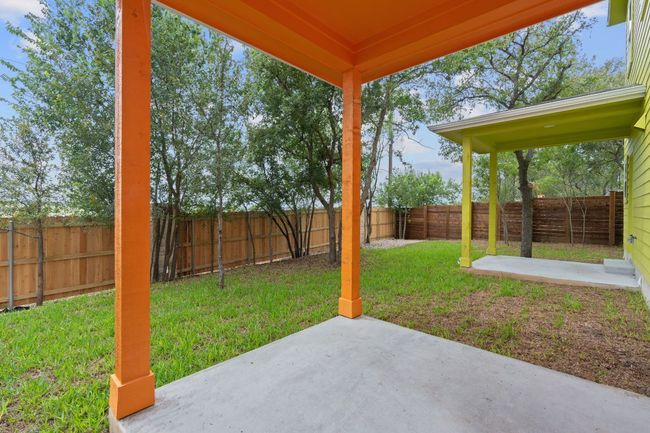 View of yard with a fenced backyard and a patio | Image 27
