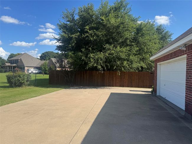 View of patio featuring a garage | Image 31