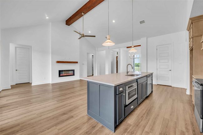 Please Note: These interior photos are not of the actual design, but are of a completed design with a similar floor plan. Finishes, features, and layouts may vary. | Image 6