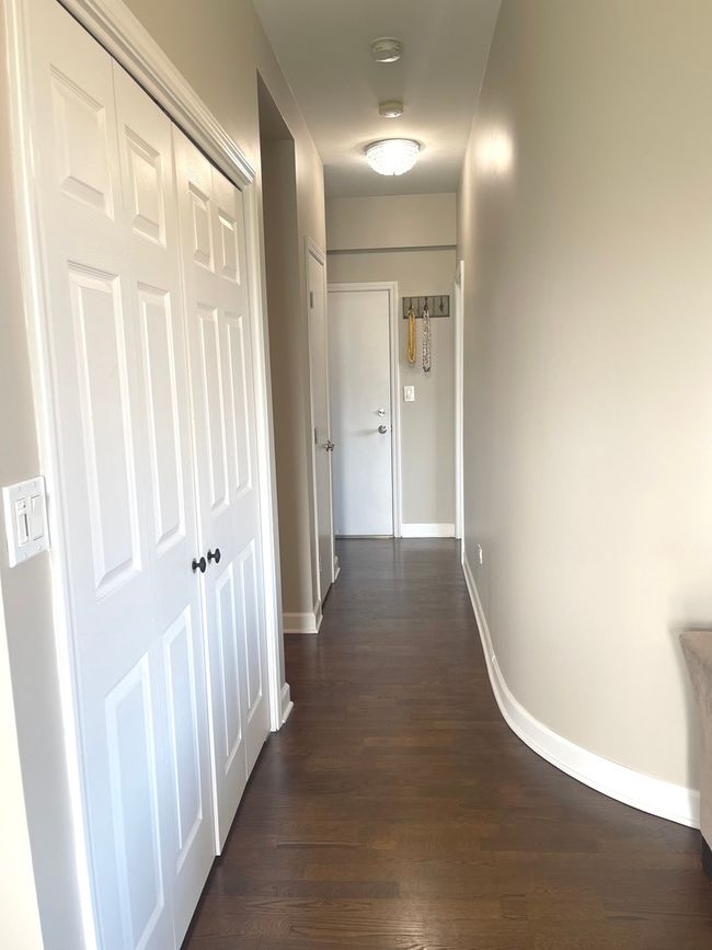 hallway from entrance - laundry closet | Image 21