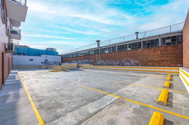 View of uncovered parking lot | Image 5