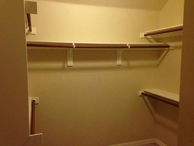 View of walk in closet | Image 10