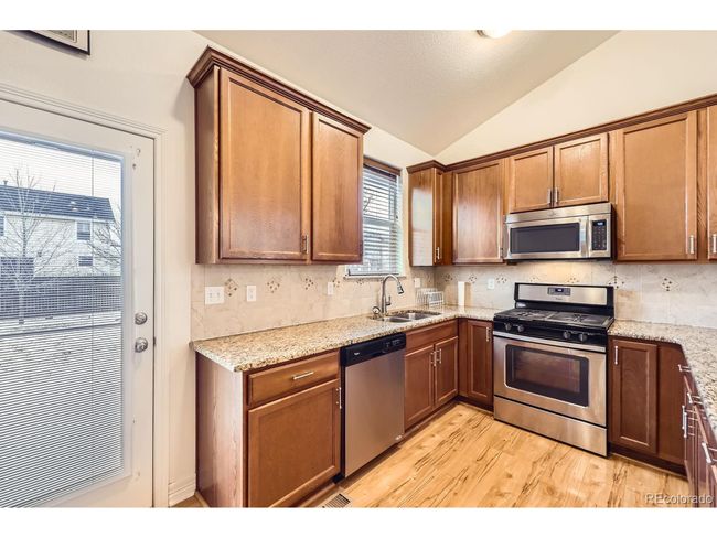 1945 Basil St, House other with 4 bedrooms, 3 bathrooms and null parking in Strasburg CO | Image 11