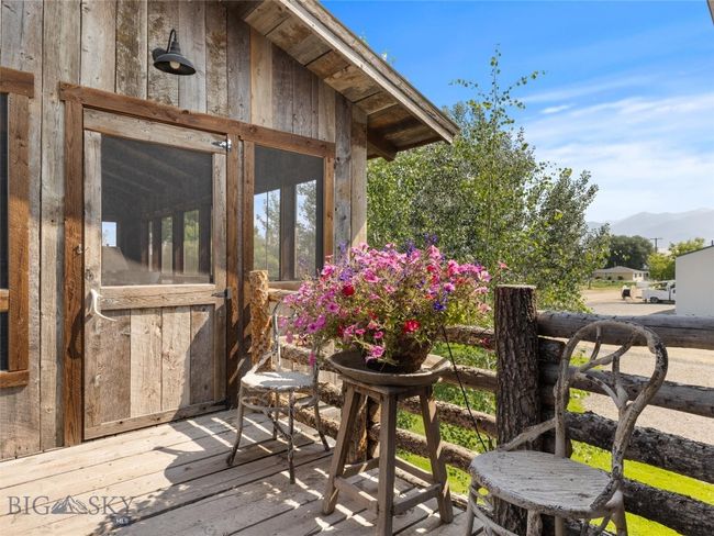 Upper deck to outdoor living room | Image 19