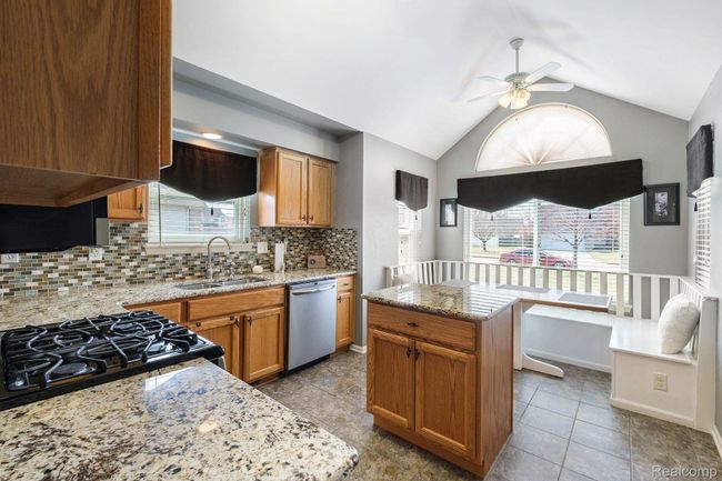 Vaulted ceiling in kitchen w/ceiling fan. | Image 12