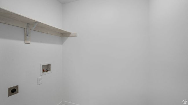 Washroom featuring hookup for a washing machine and hookup for an electric dryer | Image 15