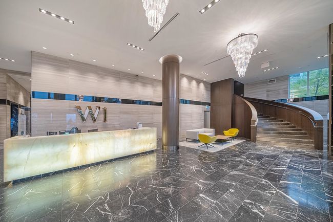Reception featuring a chandelier, recessed lighting, and ornate columns | Image 20