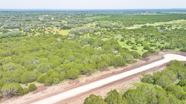 Aerial view of property's location with a forest | Image 4