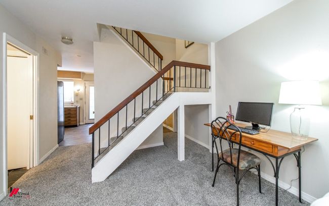Office area featuring baseboards, visible vents, and carpet floors | Image 9