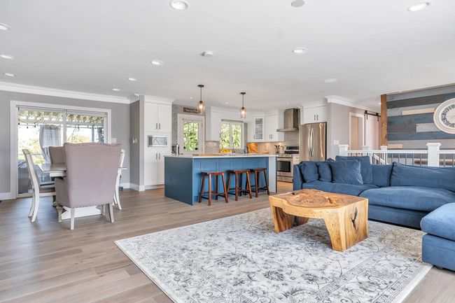 Living area featuring recessed lighting, light wood-style floors, and crown molding | Image 12