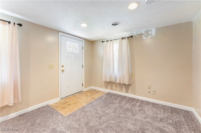 Foyer entrance with light colored carpet, visible vents, recessed lighting, and baseboards | Image 35