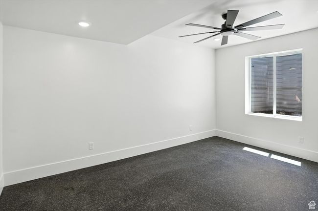 Spare room with ceiling fan and recessed lighting | Image 36