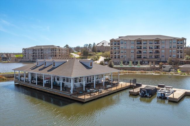 Dock area featuring a water view | Image 33