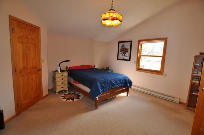 Upper level bedroom features 2 closets | Image 37