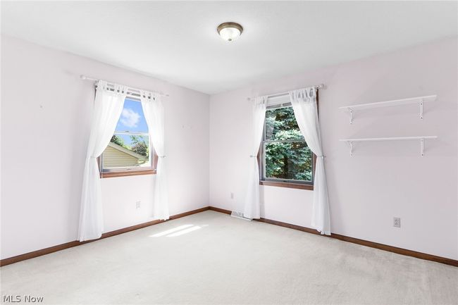 Unfurnished room with light colored carpet | Image 20