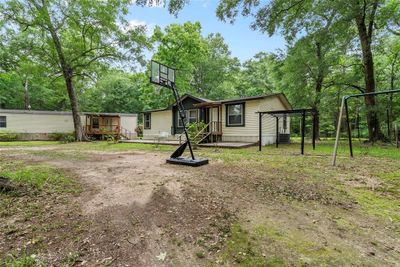 111 County Road 3379, House other with 5 bedrooms, 2 bathrooms and null parking in Cleveland TX | Image 1