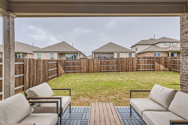 View of yard with outdoor lounge area and a fenced backyard | Image 22