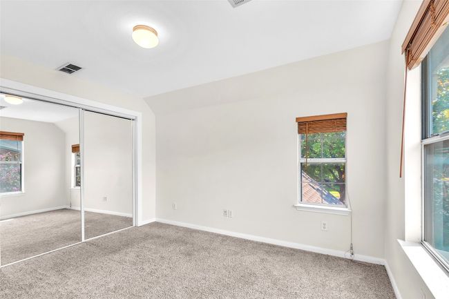 Unfurnished bedroom featuring carpet flooring and a closet | Image 24