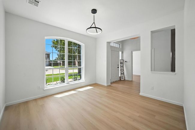 Spare room with light wood-style flooring | Image 7