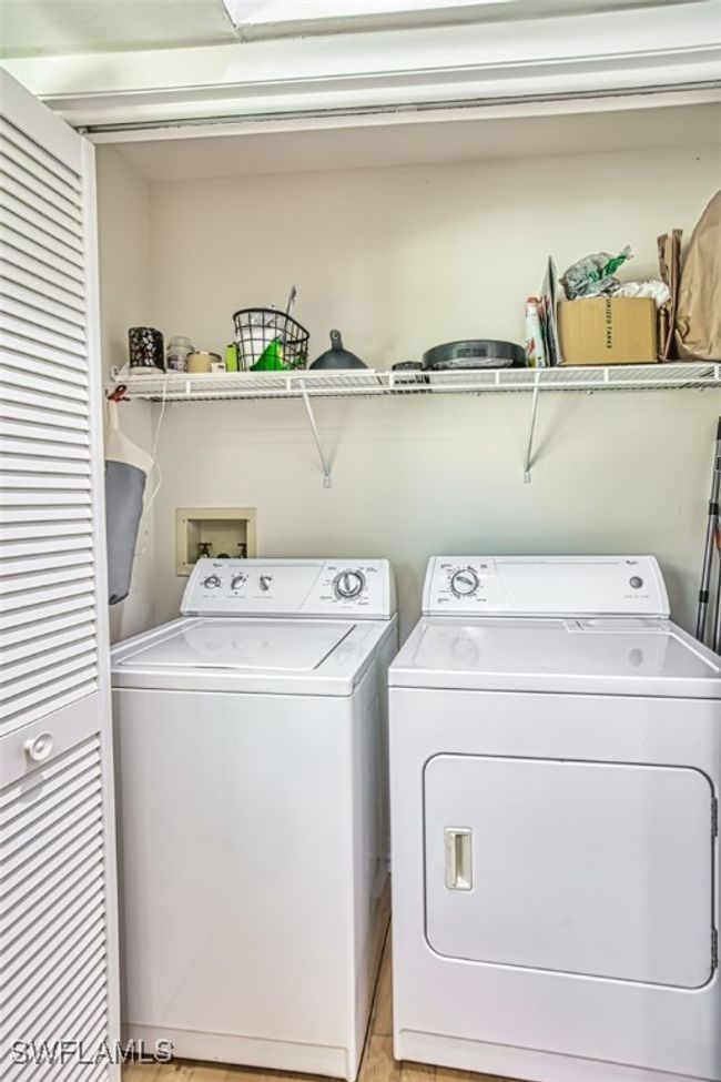 Washroom with washer and clothes dryer | Image 17