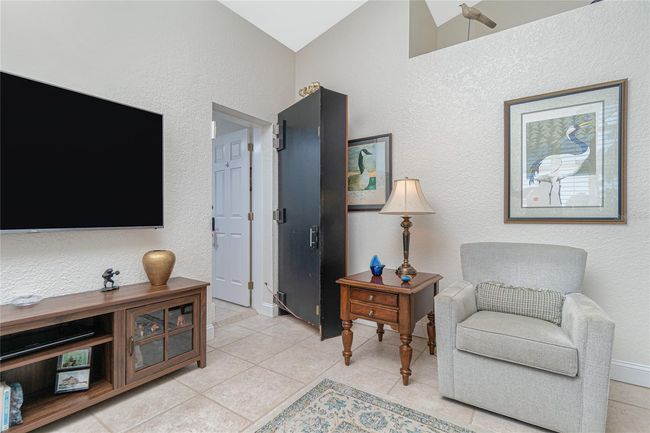 Built-in bookshelf opens to a hidden room! | Image 32