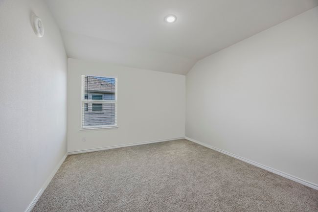 Additional living space featuring carpet floors and vaulted ceiling | Image 19