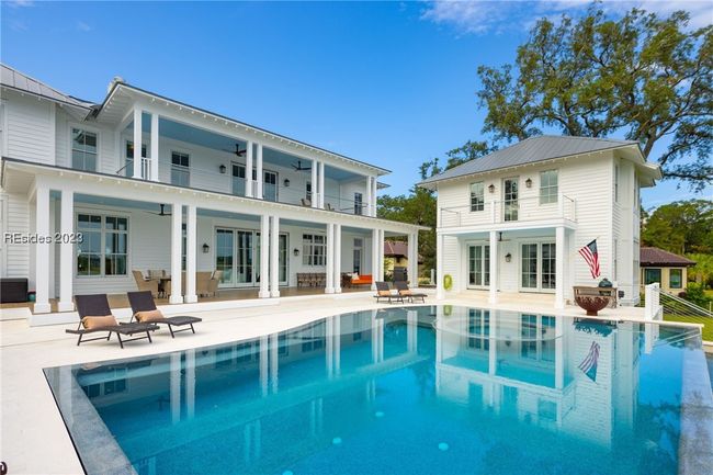 Back of house reflecting off the amazing pool | Image 5