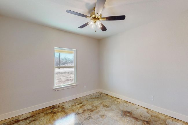 Empty room with baseboards and a ceiling fan | Image 18