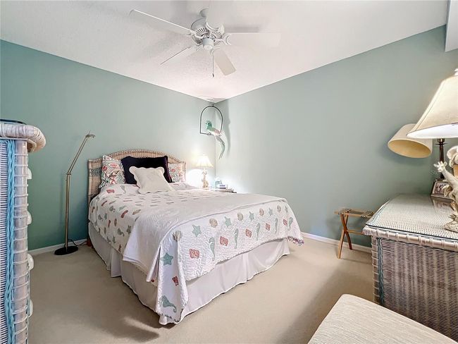 Second bedroom is located next to second bath at front of unit offering additional family or guests privacy from main living spaces | Image 34