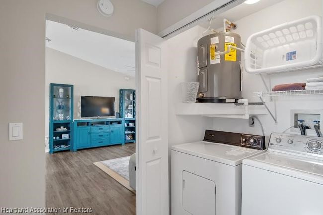 Laundry w/new elec hot water heater | Image 20