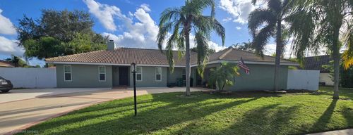 1826 Se Greendon Ave, Port St Lucie, FL, 34952-5528 | Card Image