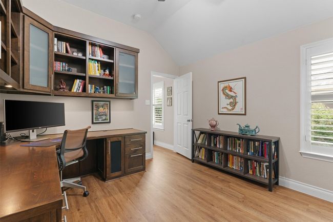 Upstairs Office area (or could be exercise room, expanded closet, etc) featuring light wood-type flooring, lofted ceiling, and baseboards | Image 18