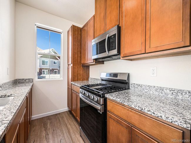 E - 5755 S Buchanan Ct, House attached with 2 bedrooms, 1 bathrooms and null parking in Aurora CO | Image 12