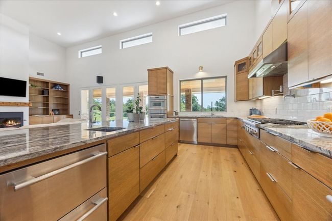 Additional refrigerated drawers in island. | Image 10