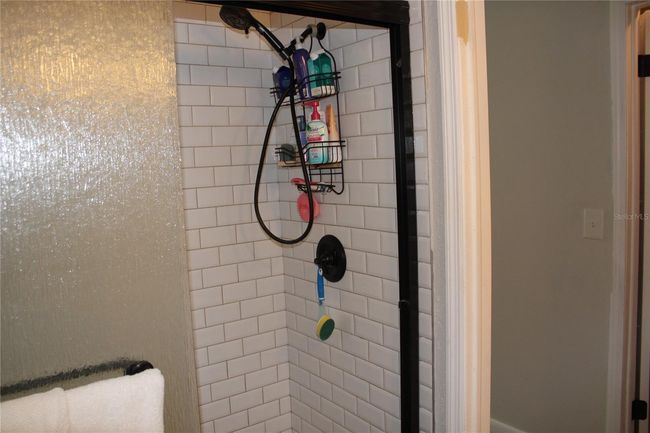 Primary bath has walk-in shower. | Image 21