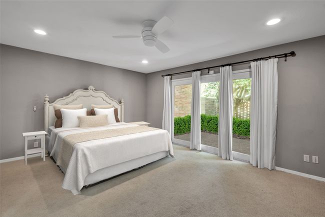 Oversized primary suite offers direct access to the private back patio. | Image 20