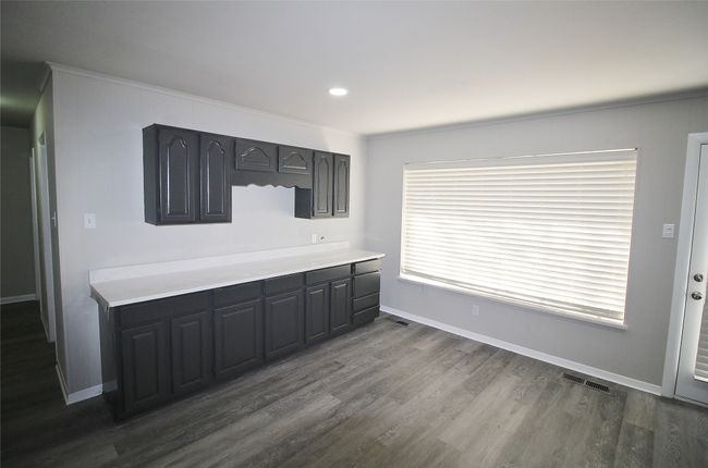 open and bright dining area with built in buffet | Image 5