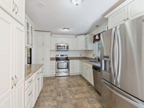 7825 Rimbley Rd, Woodbury, MN, 55125-1643 | Card Image